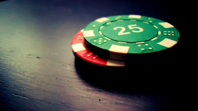 red and green casino chips for poker game