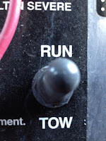 Run/Tow Switch Select the proper mode for storing your golf cart with this switch.