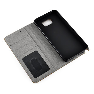 http://www.bonanza.com/listings/Leather-Case-Stand-Cover-With-Card-Slots-For-Samsung-Galaxy-Note-5-Grey/211380213