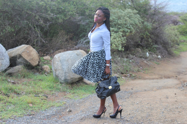 black and white polka dot skirt paired with blue and white striped shirt