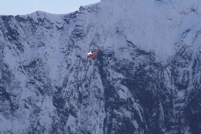 Helicopter and Mountain