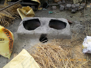 "Fire wood Burners" in a Village house for boiling the rice after harvesting .