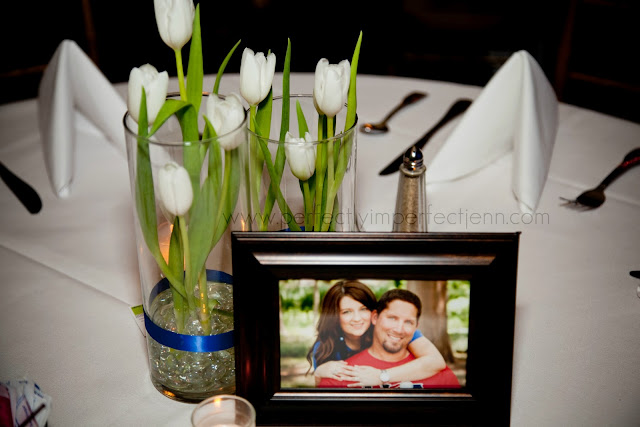 xmas wedding floral designs in tall cylinder vases