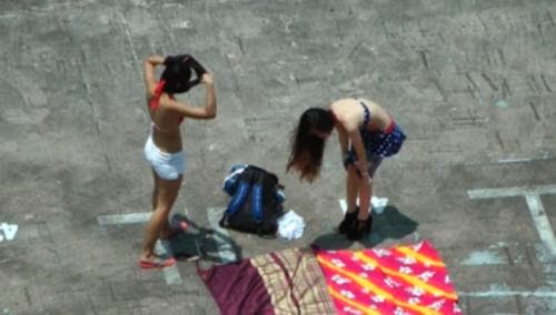 bikini women singapore carpark sun tan