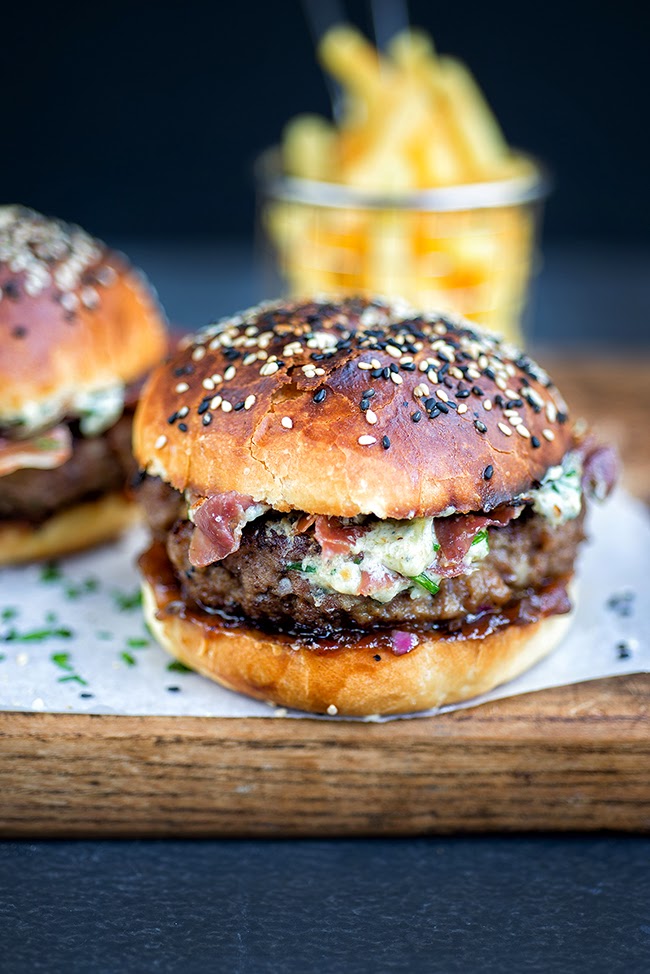 Blue cheese burgers on light brioche rolls with crispy pancetta and