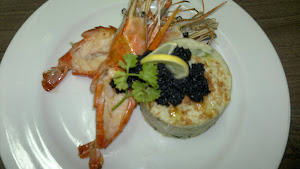 POTATO SOUFFLÉ WITH GRILLED SCAMPI AND CAVIAR