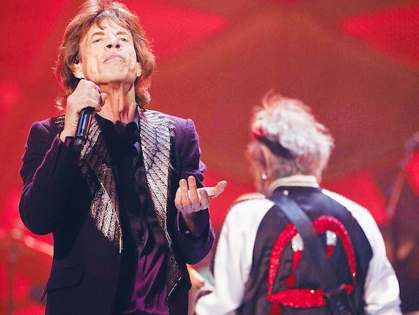 Mick Jagger with Keith Richards in Saint Laurent by Hedi Slimane Spring Summer 2014 vampire dracula blood fangs baseball varsity jacket at The Rolling Stones live at Perth Arena on 29th October 2014 in Perth Australia