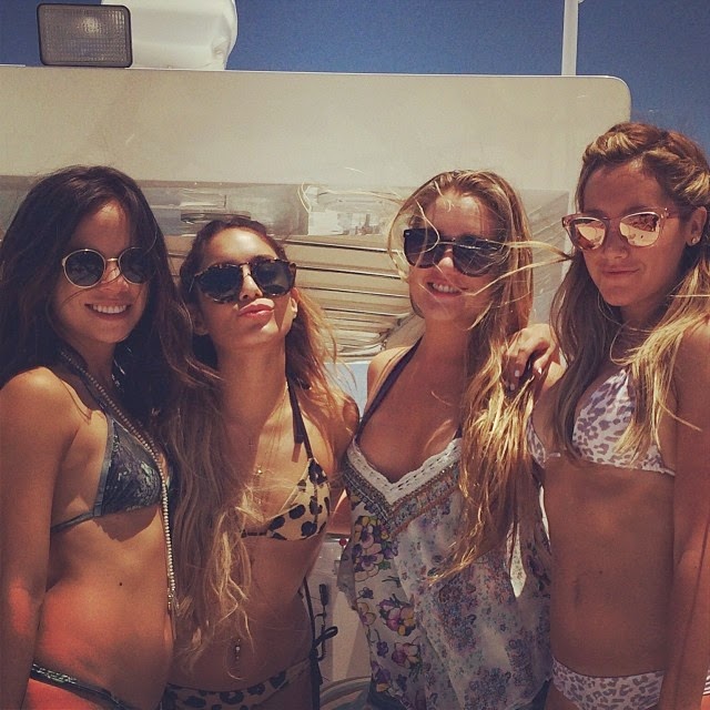 Ashley Tisdale keeps up The Bikini Fun while jumping on a yacht in Miami Ashley Tisdale wasted no time to stripping down with her female friends for yacht vacation on Saturday, May 17, 2014 at Miami, FL, USA.