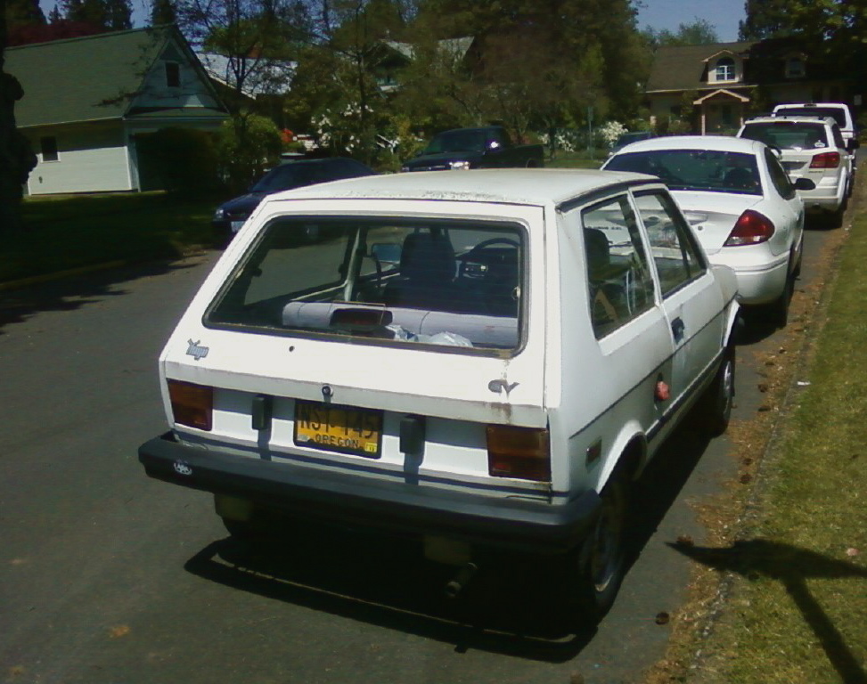 OLD PARKED CARS. Corvallis Contribution 1992 Yugo EV Hatchback.