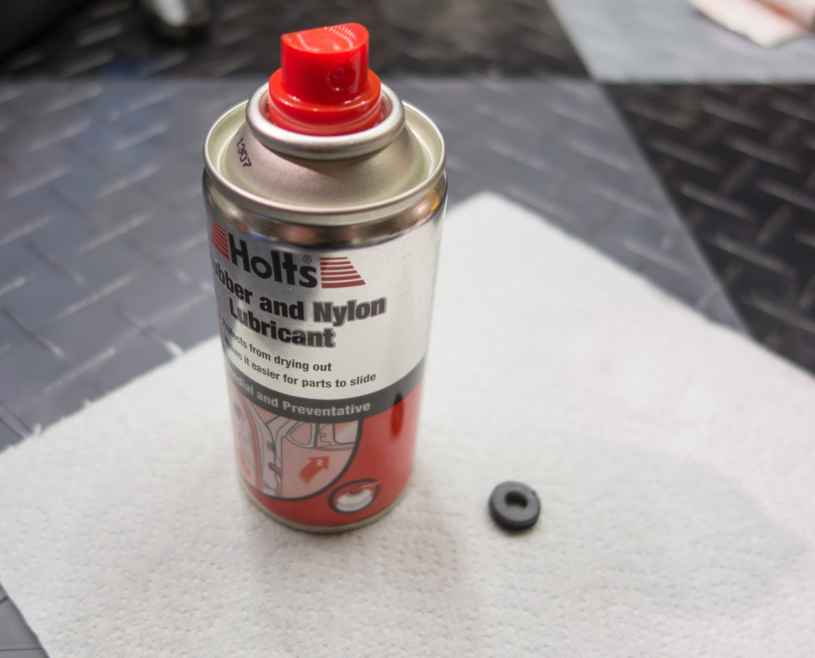 Spray a little Holts RL2R Rubebr and Nylon lubricant on the grommet.