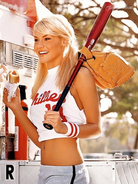 girls wearing baseball jerseys