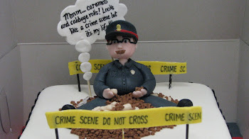Custom cake of a caramel/cabbage roll-loving cop!
