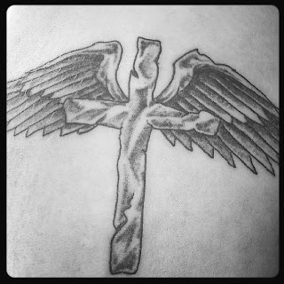 tattoo, cross and wings,