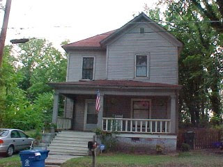 Tin shingle roof before restoration work by Denise Harrison