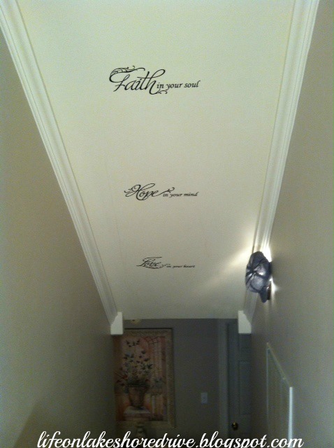 alt="vinyl wall decor art on stairs"