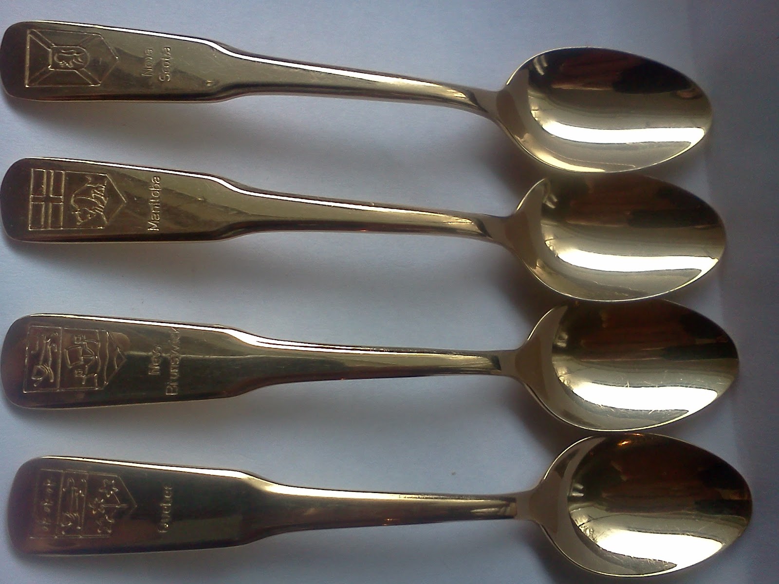 Set of 4 Collectible Spoons Tribal Starr Antiques