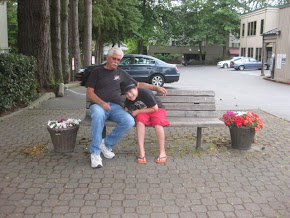 Parker & Grandpa resting on a city bench