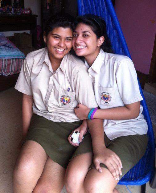 Two sri lankan girls scissoring photos