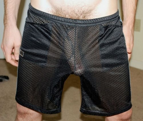 Freeballing in Black Mesh Shorts.