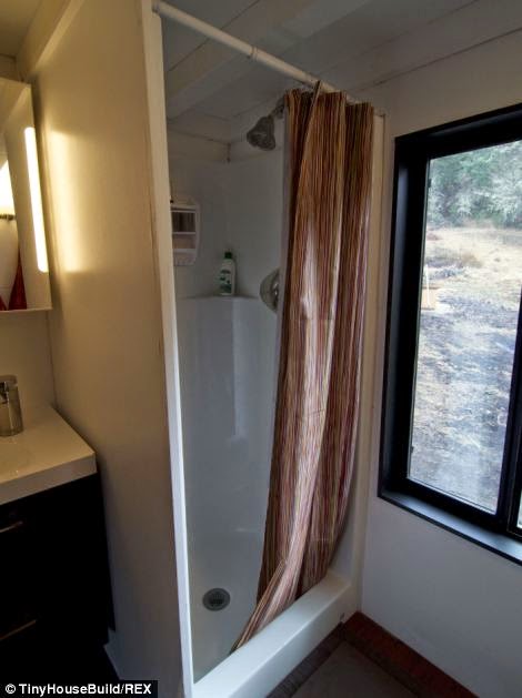 The tiny house has a shower and toilet. - This Couple Got Out Of The Rat Race. And Built This Tiny Home For $33K. The tiny house has a shower and toilet. - This Couple Got Out Of The Rat Race. And Built This Tiny Home For $33K.