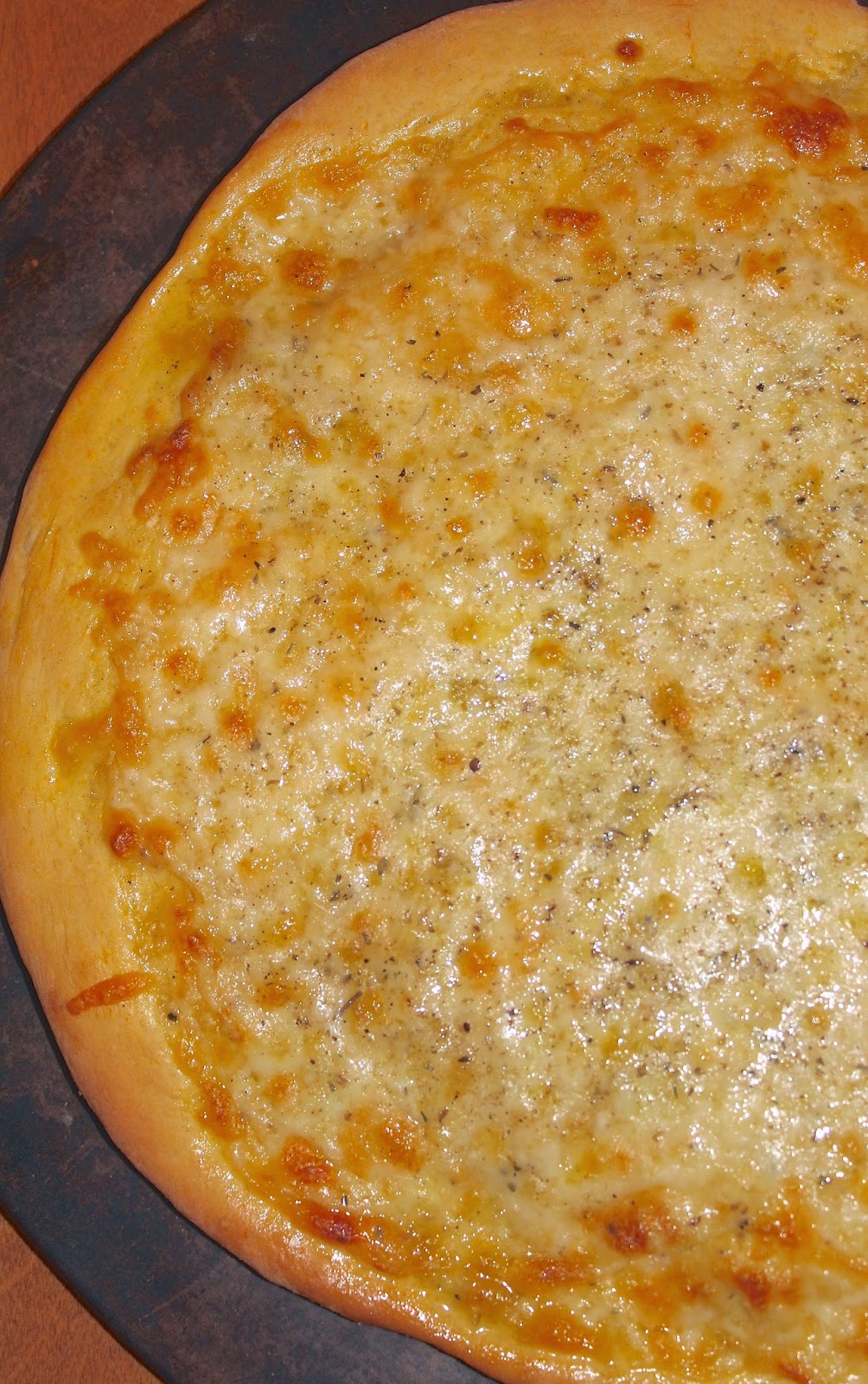 Savory Moments Three cheesegarlic pizza on pumpkin pizza dough