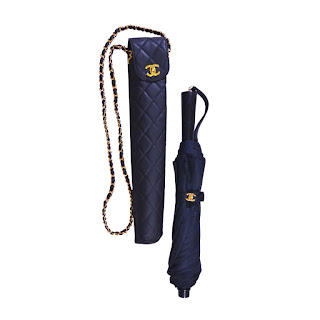 Vintage blue Chanel umbrella and umbrella case with gold hardare.