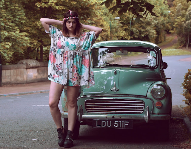 morris minor vintage car, hippy inspired vintage look, floral miss guided dress, perfect festival wear, styled with a hippy bohemian flower head chain. morris minor vintage car, hippy inspired vintage look, floral miss guided dress, perfect festival wear, styled with a hippy bohemian flower head chain.