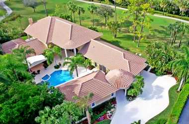 SPECTACULAR custom courtyard pool home, expansive golf views, like a private resort.