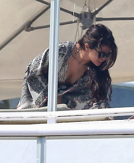 Selena Gomez wearing a Zebra Bikini and Tattoo in Miami