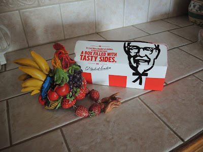 Frooster the fruit rooster considering KFC.