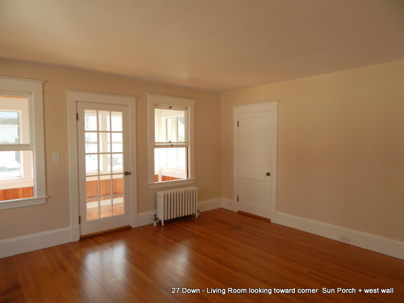 Living Room looking toward Sun Porch & Front Entry Door