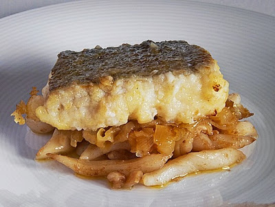 Bacalao Frito Sobre Tiras De Sepia Y Cebolla Confitada
