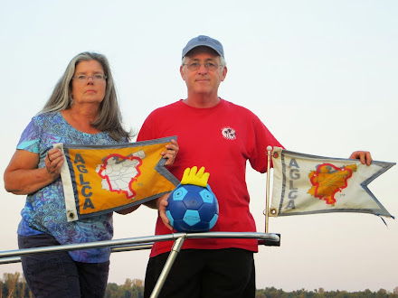 "Wilson" And The Changing Of The Burgee From White To Gold, Signifying Completion Of The Loop