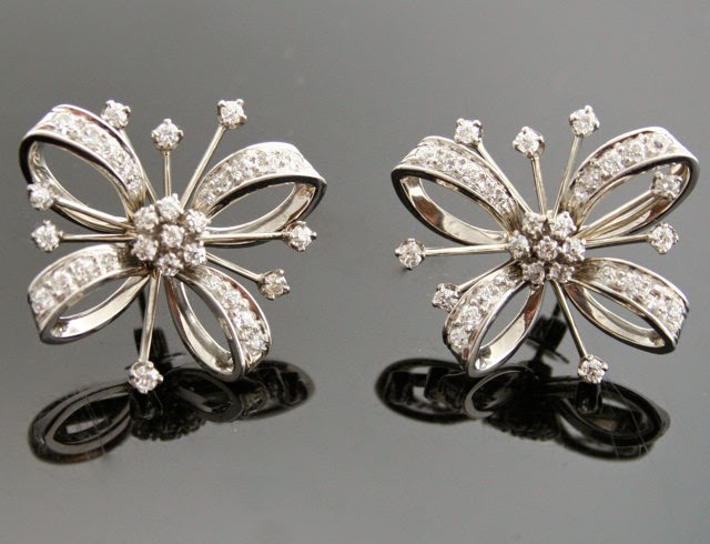 antique diamond earrings with flower shape