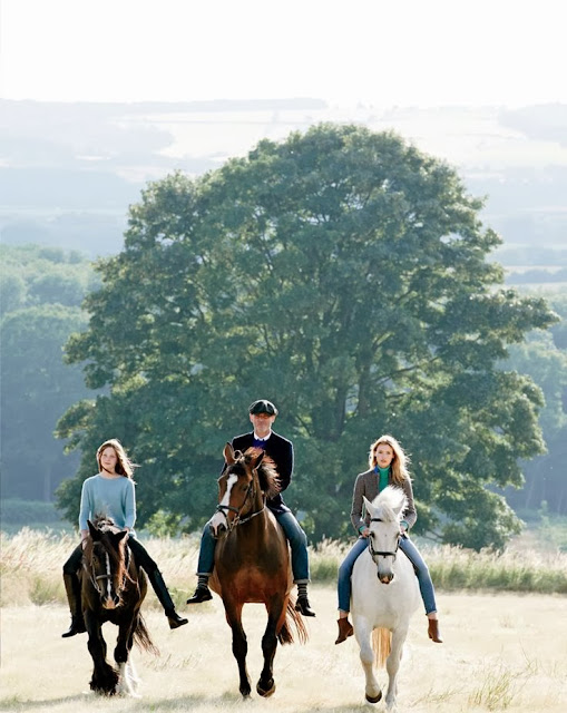 people riding horses in Cotswold