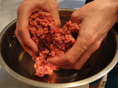combine beef and ingredients by hand