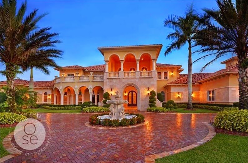 An Opulent, Stunning Mediterranean Residence with Uninterrupted Lake Views.