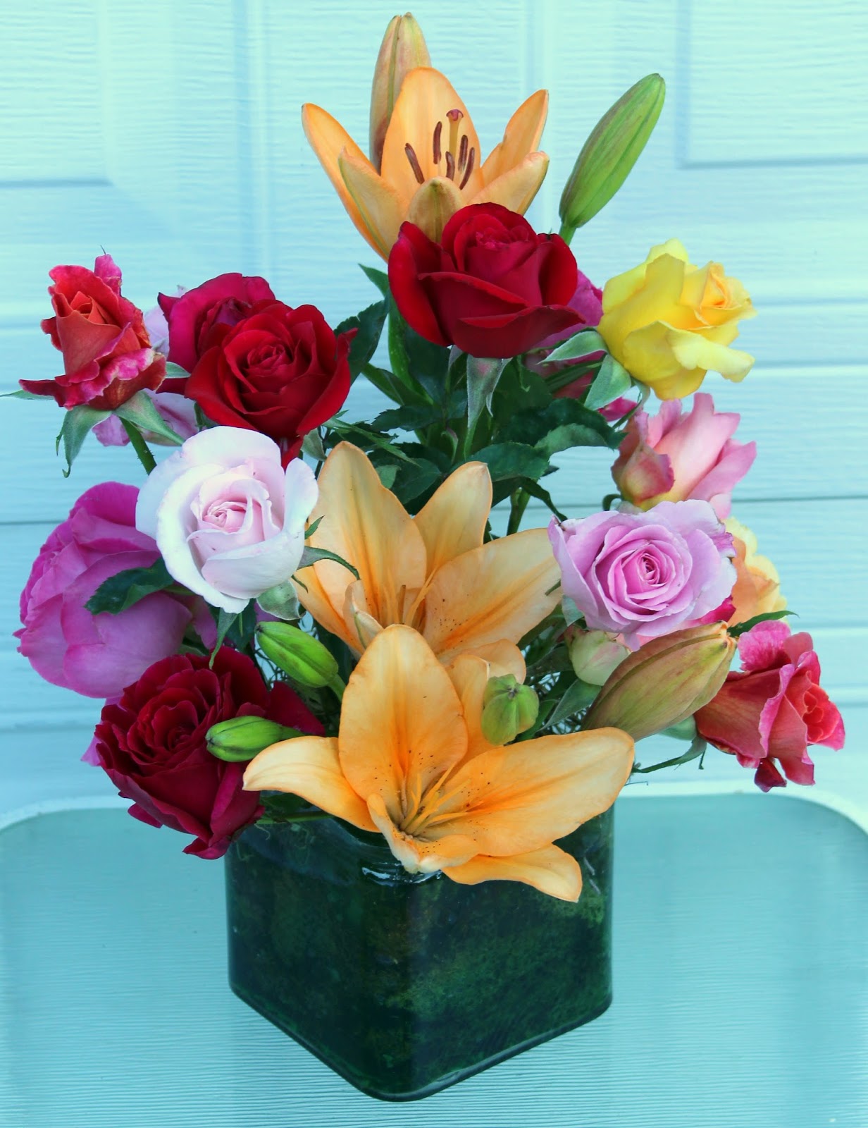 ARRANGEMENTS IN THE FIRST WEEK OF JUNERoses, Lilies Sowing the Seeds