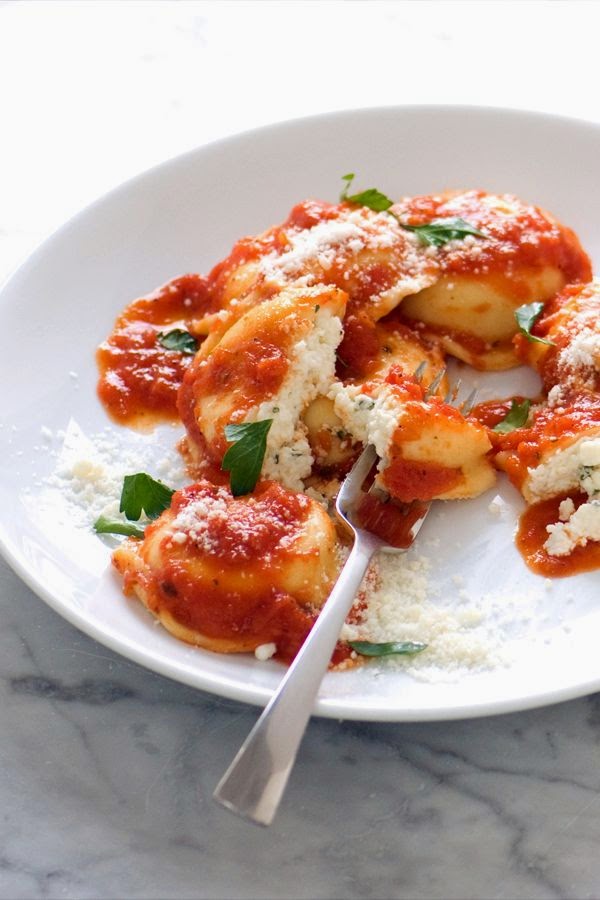 Homemade Ravioli with Spinach and Ricotta cheese filling, in Tomato