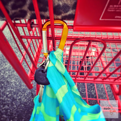 Use a carabiner to keep shopping bags in order :: OrganizingMadeFun.com