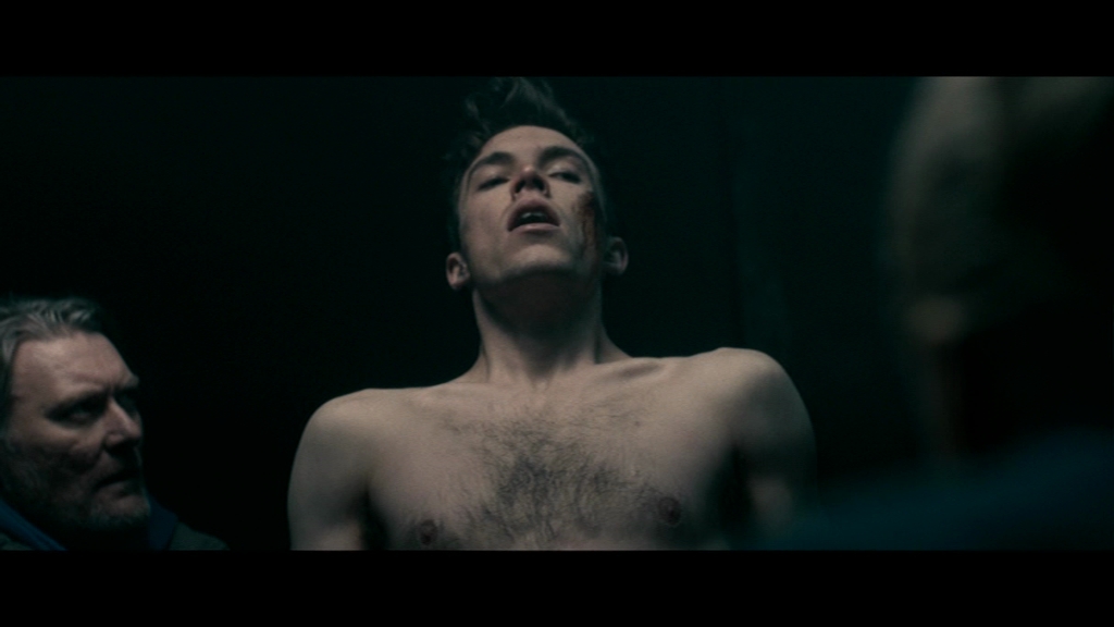 Tom Hughes - Shirtless, Barefoot & Naked in "I Am Soldier" .