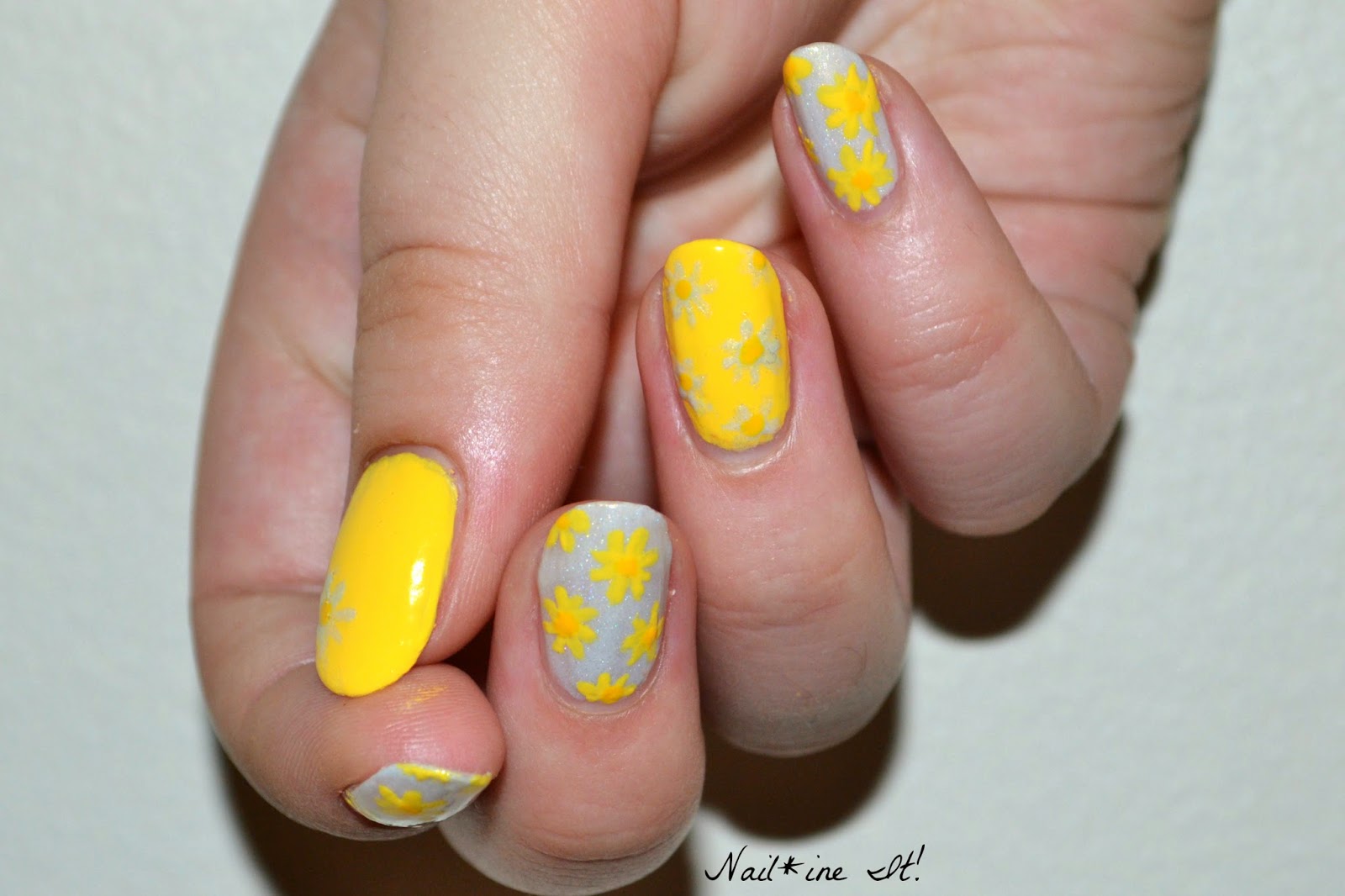 canary yellow nail design