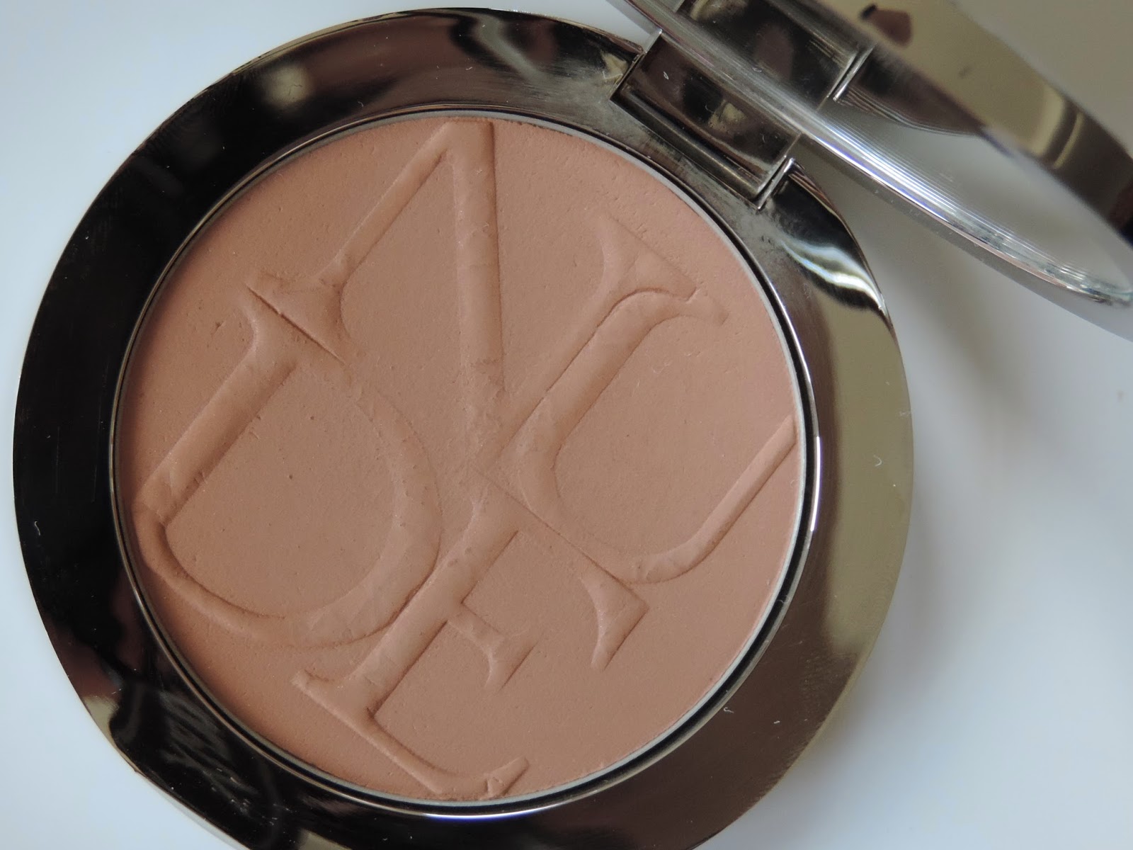 Dior Skin Nude Tan in Amber 002