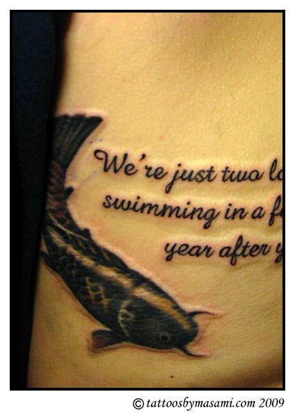 a pair of koi fish tattoo