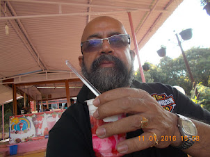 Relishing a "Strawberry Cream" milkshake at the strawberry farm.