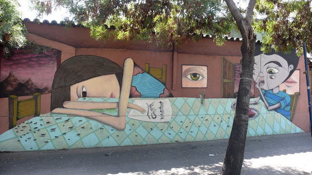 street art in santiago de chile barrio patronato arte callejero by piguan and bus