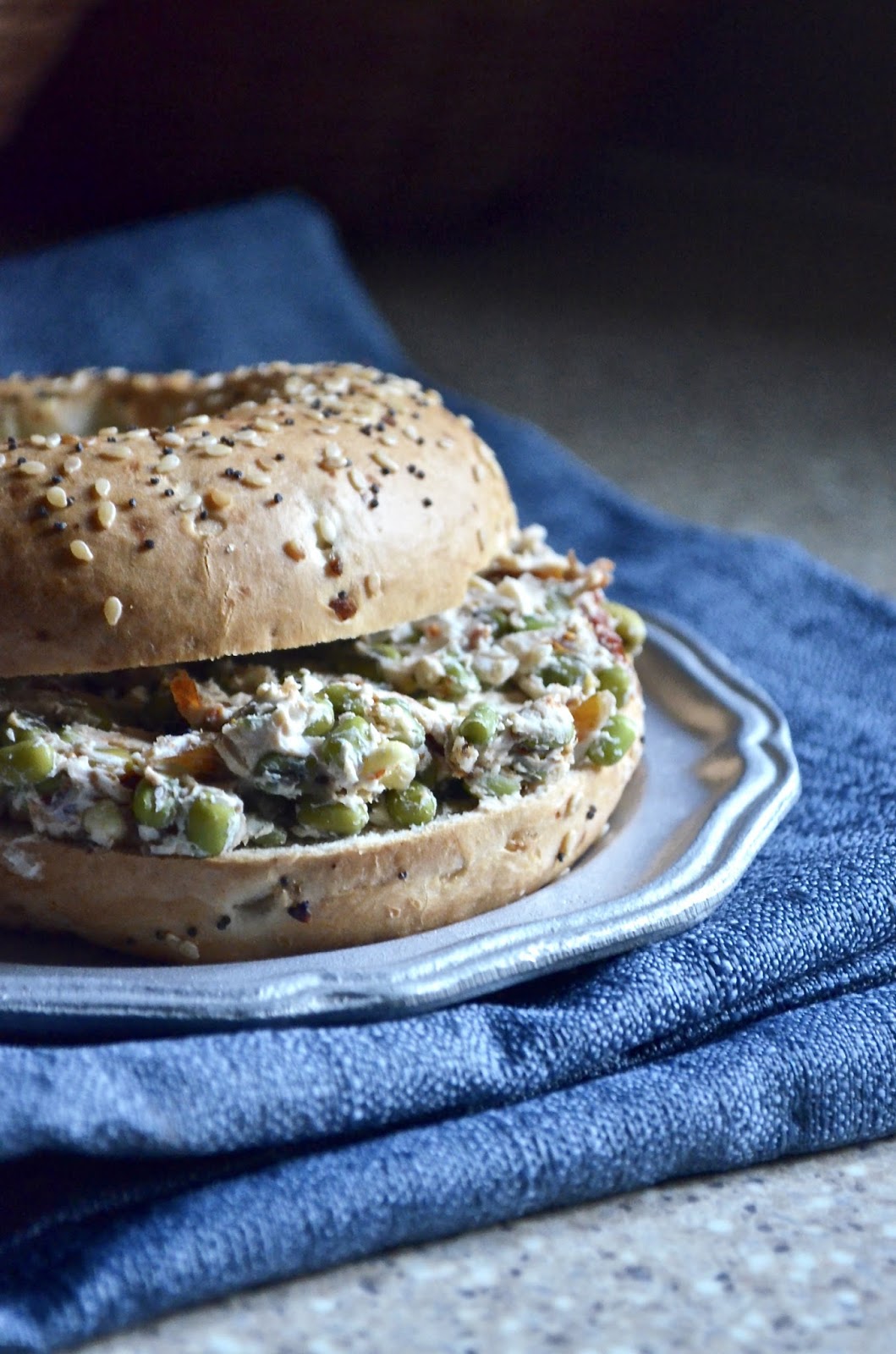 Dishing With Divya Bagel Sandwich with Sundried Tomato, Raw sprouts