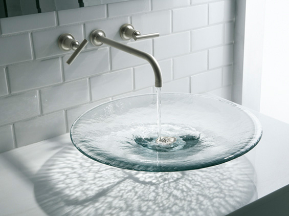 Glassmakers heat, pour and cool glass to shape timeless vessel, drop ...
