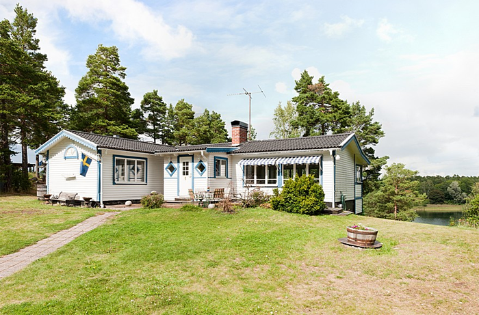 ESTILO RUSTICO: CASA RUSTICA DE MADERA EN SUECIA