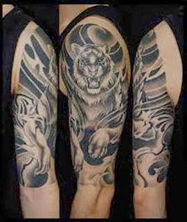 Tatuagens de tigres masculinas no braço
